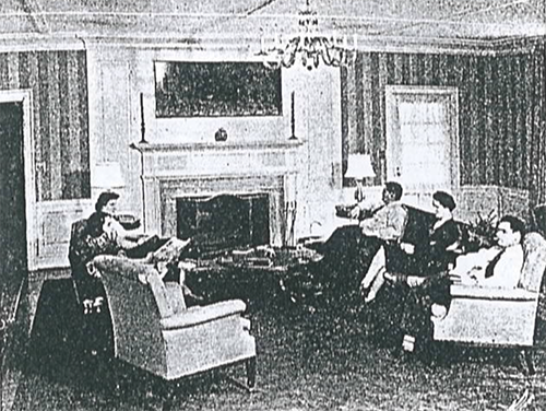 guests seated on sofa