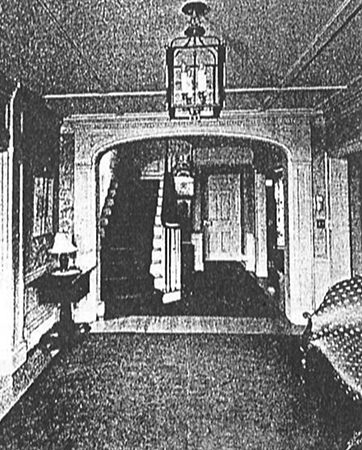 Historic photo of the Giesy home entrance hall with a grandfather clock