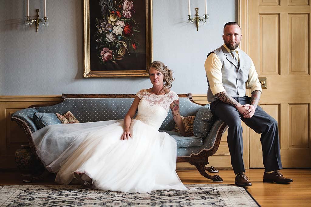 Couple seated in the house parlor