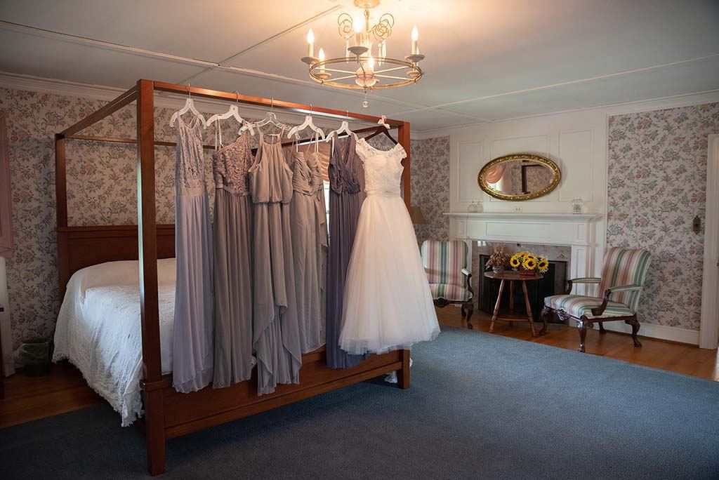 Bridal suite with bridesmaid dresses hanging
